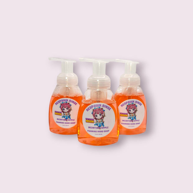 Three bottles of soap with cartoon character labels on a light gray background